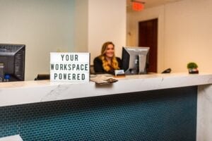 An administrative team member at a serviced office